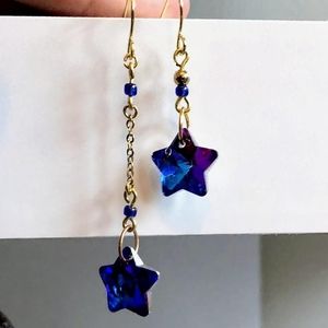Asymmetrical star drop earrings